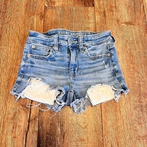 American Eagle Outfitters Light Blue Distressed Denim Shorts with Lace Insets